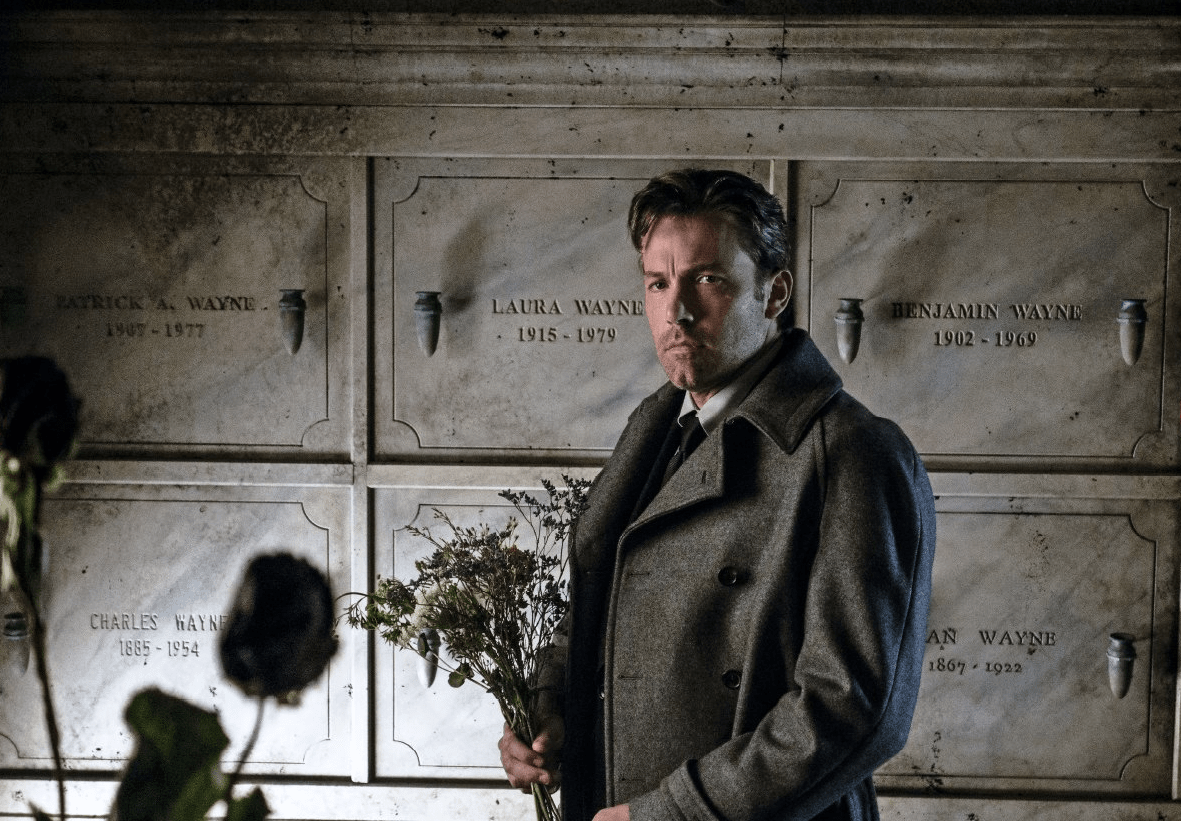 bruce_stands_in_the_wayne_mausoleum1-e1518563091781.png